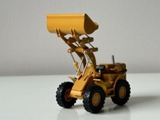 Traxcavator Tractor Loader