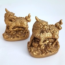 Pair of Gold Coloured Qilin /