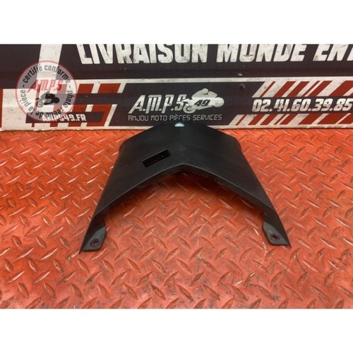 Plastic cover under rear seat
