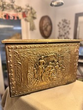 VINTAGE EMBOSSED BRASS ON WOOD