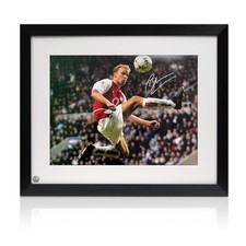 Dennis Bergkamp Signed Arsenal Football Photo: Statue. Framed