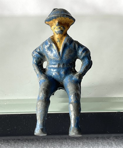 Vintage seated toy soldier - seated,