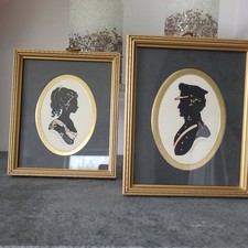 2 Silhouette Framed Pictures