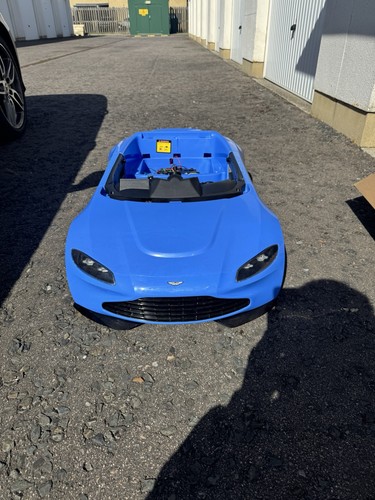 Brand new blue aston martin - brand,