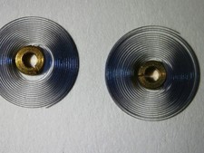 Vintage watchmakers hairspring joblot 14 + looks to be new brass centre