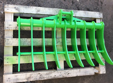 Excavator digger root rake