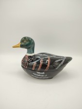 Terrine in sling, signed