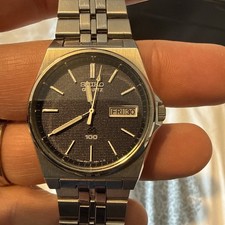 Seiko SQ100 - 6923 8010 -