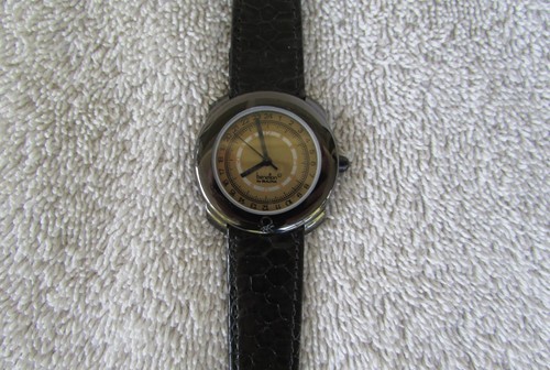 Vtg benetton bulova 34mm - by,