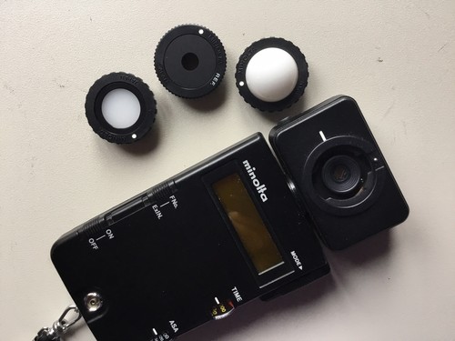 Cased minolta flash - minolta, iii