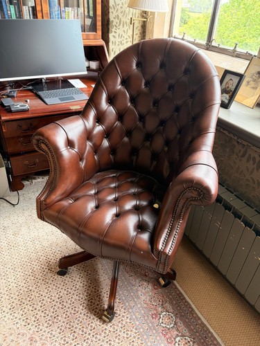 Brown leather tufted swivel - leather,