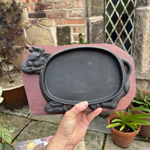 Cast iron cow - shaped, sizzling