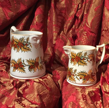 Rare Pair of Christmas Jugs by