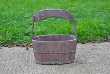 old vintage wooden rice bucket