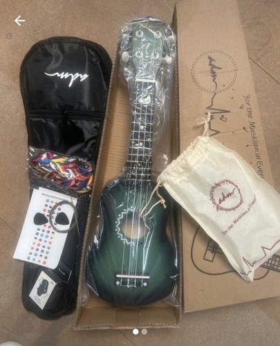 Ukulele set with tuner - tuner/bag, etc