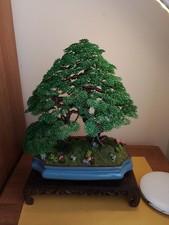Large oak and small one - one, in
