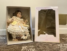 Regency Fine Arts Collector Edition Porcelain Doll Chloe RF6092 On Wicker Chair