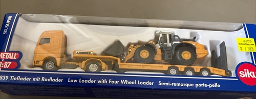 Low loader with four - low, wheel