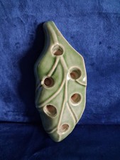 Leaf shaped candle holder for