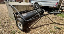 Towable lawn and leaf sweeper