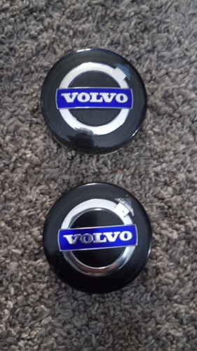 Two volvo alloy - wheel, centre