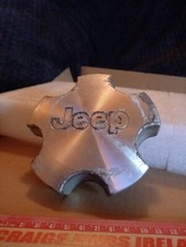 Jeep Grand Cherokee / Wrangler center cap, 2001-2004 part number 5HF45TRMAA