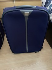 TRIPP SUITCASES with flight bag and carry on overnight case.