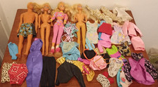 Vintage Barbie dolls and clothing bundle