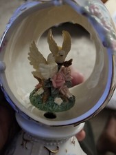 Porcelain Egg Musical Spinning Doves