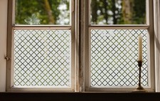 Privacy etched glass window