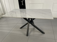Ceramic x spider leg table