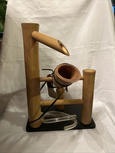 Bamboo rocking water garden - rocking,