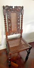 A Charles II carved walnut and cane chair antique chair c. 1670