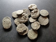 Five Encrusted Roman Bronze Coins for Cleaning and Identification.