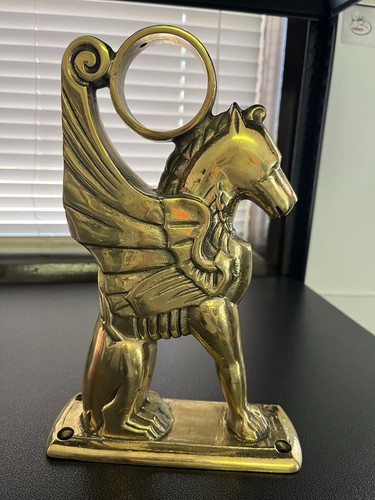 Ornate brass mythological