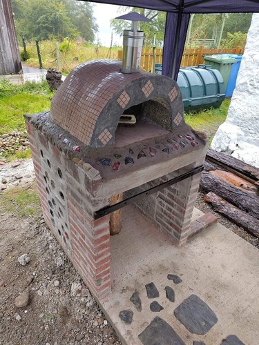 Wood fired pizza oven - fired,