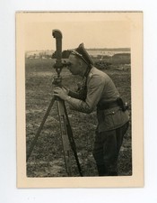 German Officer looking through