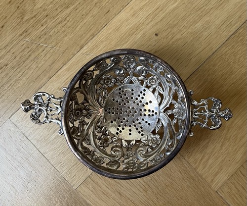 Beautiful silver tea strainer - silver,