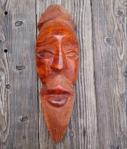 Hand carved solid wood tribal