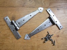 Rustic iron T hinges Hand