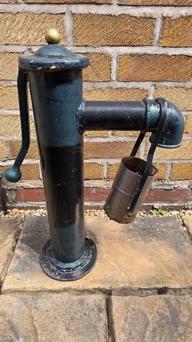 Vintage cast iron hand - cast‑iron, water