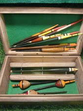 A Selection Of Fifteen Vintage Fishing Floats In An Old Wooden Box. Cork, Quil