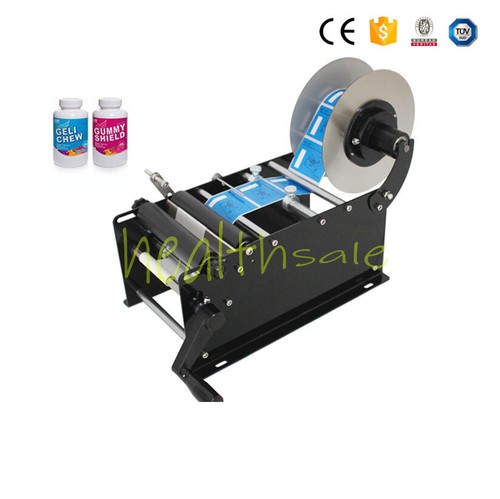 Manual round bottle labeling - manual,