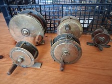 Five old brass fishing reels angling display Milbro