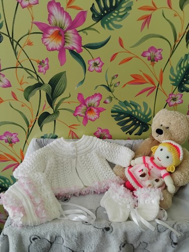 Hand knitted babys white