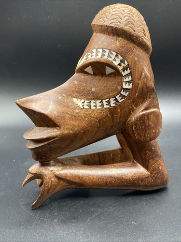 Hand carved nguzu pearl - carved,