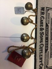 4 Vintage 1960’s Graduated Etched Brass Bells of Sarna on Multi-Colored Cord