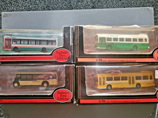 boxed corgi buses
