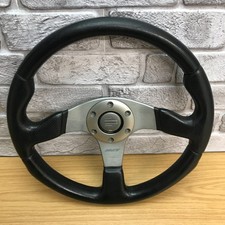 Genuine Momo Race black leather, 3 spoke, 350mm steering wheel. Dated 1999.   8A