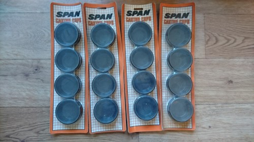 Vintage span castor cups - span,